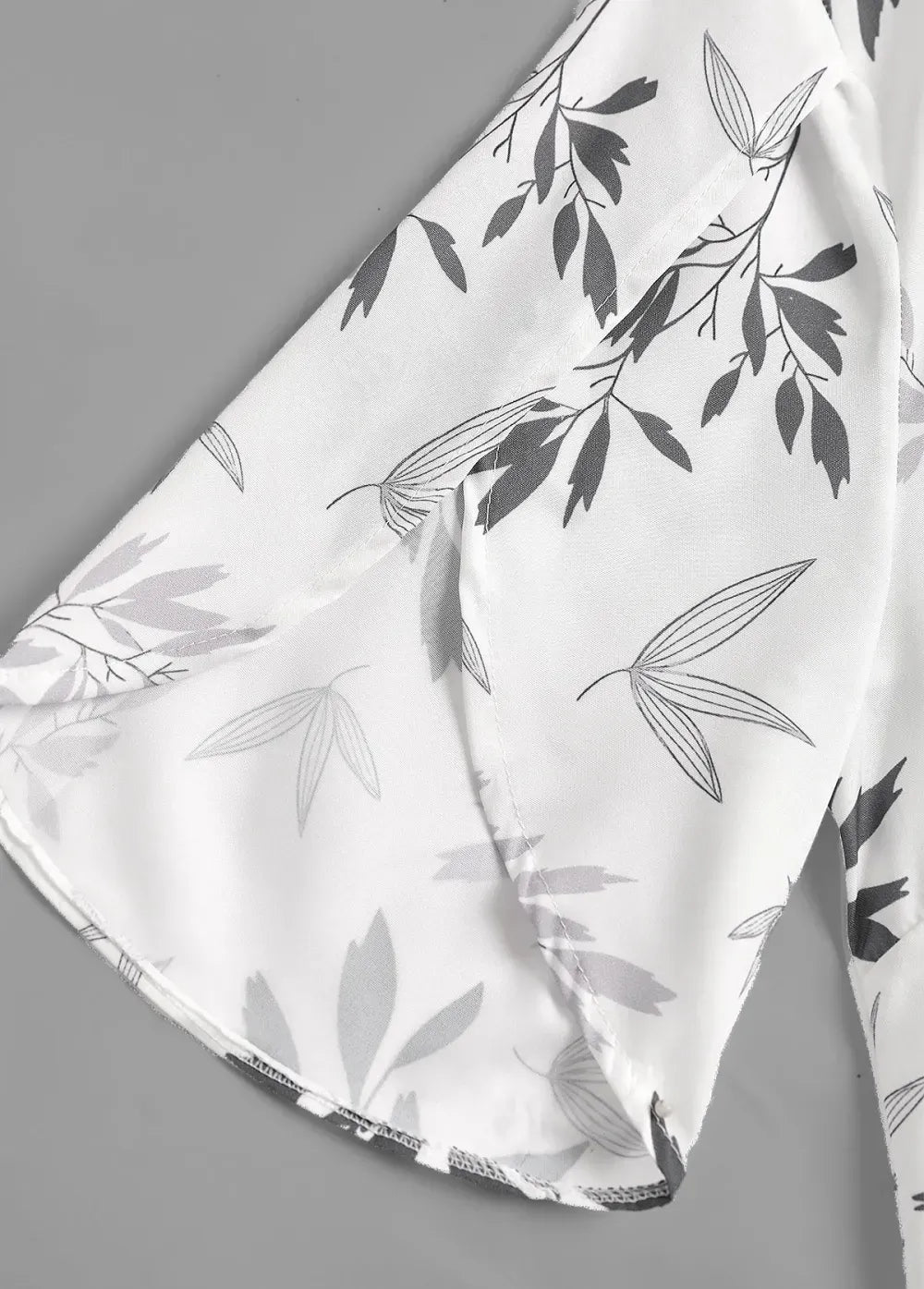 White Ruffle Leaf Print Half Sleeve V Neck Blouse